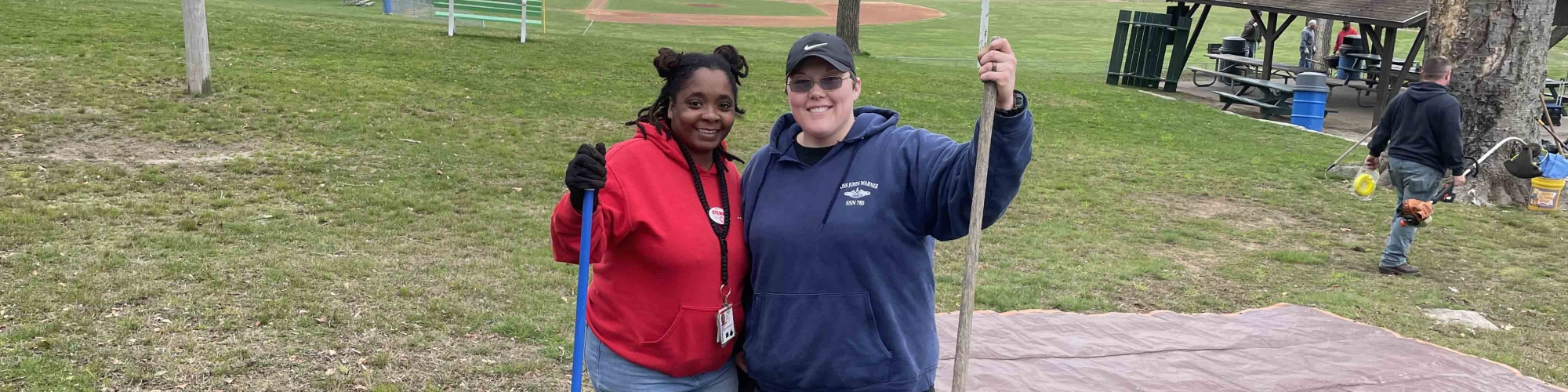 Volunteers doing landscaping and cleanup at a park