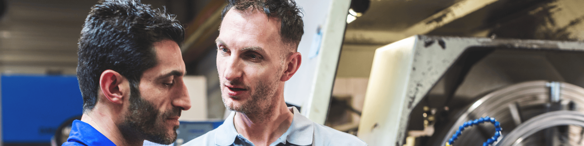 Workers talking to each other on the shop floor